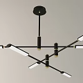 Modern Black Metal Chandelier With Multiple Slender Arms And White Tube Lights