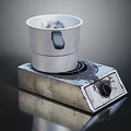 Silver Metallic Cup On Textured Metal Heating Plate For Daily Household Items