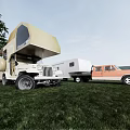 Off Road Camping Vehicle With Pickup Truck And Trailer In Grassy Field