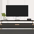 Modern TV Stand With Flat Screen TV Metal Frame Drawers Green Plant And Decorative Items