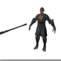 Bald Man In Traditional Green Robe Holding Long Wooden Staff With Leather Straps