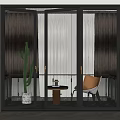 Modern Indoor Relaxation Space With Black Frame Glass Sliding Doors Gray Curtains And Beige Chair
