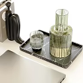 Modern Decorative Accessories Collection Featuring Camera Books Laptop Headphones And Tray
