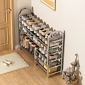 Multi Tiered Metal Shoe Rack Organizing Various Shoes In Entryway With Wooden Floor And Rug