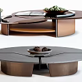 Modern Round Coffee Table With Metal Frame And Decorative Elements Like Tray And Vase