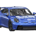 Sleek Blue Sports Car With Rear Spoiler Black Wheels And Aerodynamic Design