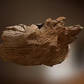 Weathered Stone Wood Decorative Piece With Natural Rough Texture And Irregular Shape