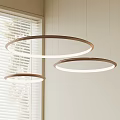 Three Modern Circular Pendant Lights With Soft Light Near Window Blinds 3d model