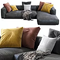 Large Sectional Sofa with Yellow Brown White Pillows and Cozy Throw Blanket