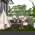 Garden Courtyard with Teepee Tent Outdoor Furniture Green Plants Grass Lawn and Stone Stepping Stones