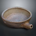 Handcrafted Stone Sculpture Carving Bowl Shaped Artifact With Textured Surface And Handle Hole Design