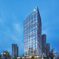 Modern Glass Curtain Wall Skyscraper In Urban Skyline With Surrounding Buildings