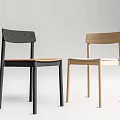 Two Modern Dining Chairs In Black And Light Wood With Simple Backrest Design