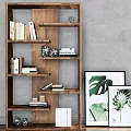 Modern Wooden Bookcase With Open Shelves Holding Books Decorative Items And Plant Prints
