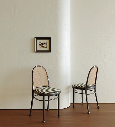 Dining Chairs With Rattan Backrest Striped Seat Black Frame On Light Colored Wall With Artwork 3d model