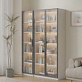 Modern Wooden Glass Door Bookcase Interior With Books Decorative Vases And Sculptures In Living Room
