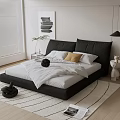 Modern Double Bed with Black Headboard White Sheets Yellow Pillows and Wooden Floor Bedroom