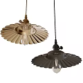 Two Stylish Metallic Pendant Lights With Gold And Black Petal Shaped Shades And Clear Bulbs