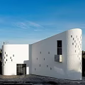 Modern Museum Building With White Exterior And Unique Illuminated Architectural Features
