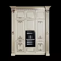 Classic Light Colored Kitchen Cabinets With Intricate Carvings And Built In Oven