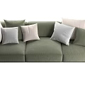 Cozy Green Three Seater Sofa With Multiple Cushions In Various Soft Tones