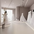 Elegant Wedding Dress Store Interior With Chandelier And Large Windows