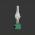 Green Glass Bottle With Silver Top On Blue Square Mat With Brown Spots
