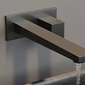 Black Wall Mounted Faucet With Water Droplets Over Black Marble Sink On Gray Wall