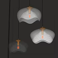 Three Modern Pendant Lights With Transparent Glass Shades Gold Accents Minimalist Interior Design