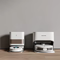 Sleek White Robotic Vacuum Cleaners In Modern Home With Wooden Floor And Gray Wall