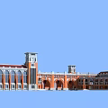 Red And White School Building With Towers Arched Entrances And Classical Exterior