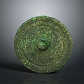 Ancient Bronze Mirror With Circular Shape Intricate Carvings Text Inscriptions And Green Patina