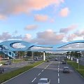 Modern Blue Curved Bridge Over Urban Road With Vehicles And High Rise Buildings