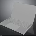 Sleek White Open Laptop Placed On Black Smooth Surface For Electronics