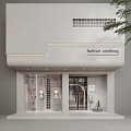 Modern Fashion Clothing Storefront With Glass Doors Display Windows And Mannequins