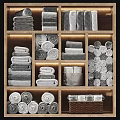 Soft Gray Cotton Towels Rolled And Stacked On Organized Wooden Shelf