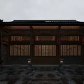 Traditional Ancient Architecture Courtyard With Wooden Roof Carved Windows People And Stone Floor