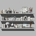 Decorative Ornament Combination With Books Sculptures Vases Plants And Geometric Ornaments On White Shelves