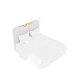 Double Bed with White Bed Sheets Pillows and White Headboard Golden Decoration