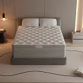 Comfortable Diamond Stitched Mattress in Modern Bedroom with Nightstand Lamp and Open Book