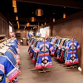 Organized Cloakroom Space Featuring Wooden Lockers Arched Mirrors And Hanging Clothes