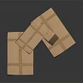 Stacked Brown Cardboard Boxes Sealed With Packing Tape On Dark Surface