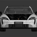 Porsche Electric Sports Car With Silver Body Black Roof And Sleek Modern Design