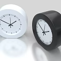 Modern Round White and Black Clocks with Minimalist Design on Sleek Surface