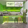 Plan Z Café Interior With Green Walls Open Counter Colorful Stools And Cartoon Sculpture