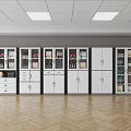 Row Of Modern White Bookcases With Glass Doors And Wooden Shelves On Herringbone Floor