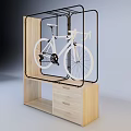 Wooden Display Cabinet Shelf With Black Metal Frame Holding White Bicycle And Drawers