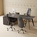 Modern Office Desk And Chairs Setup With Computer Monitor Keyboard Mouse And Potted Plant