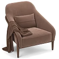 Brown Velvet Lounge Chair with Cushion Throw Blanket and Elegant Modern Design