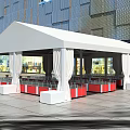 White Canopy With Pillars Under Modern Building Featuring Tables and Chairs 3d model
